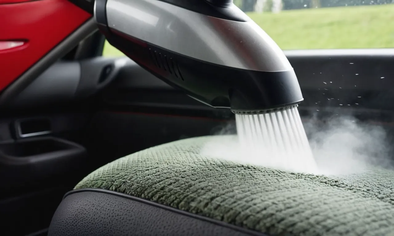 A close-up shot of a powerful steam cleaner nozzle effortlessly removing dirt and grime from a car's upholstery, leaving it spotless and refreshed.