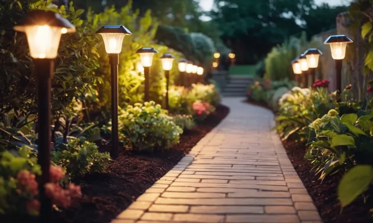 A close-up shot capturing the soft glow of a set of elegant solar path lights, illuminating a garden pathway and creating a magical ambiance in the evening.