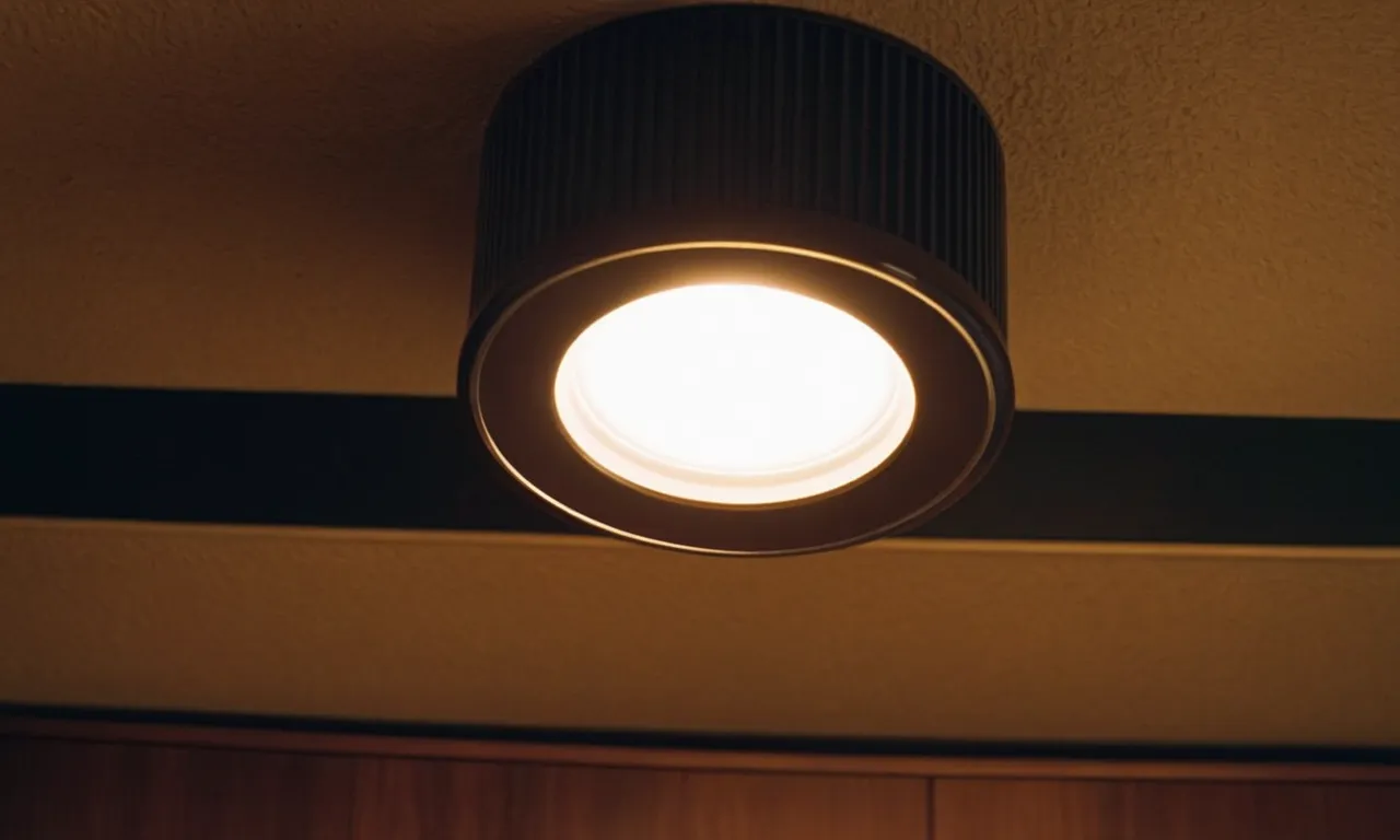 A close-up shot of a modern recessed lighting fixture illuminating a room with a warm, vibrant glow, showcasing the effectiveness and quality of the best LED bulb for recessed lighting.
