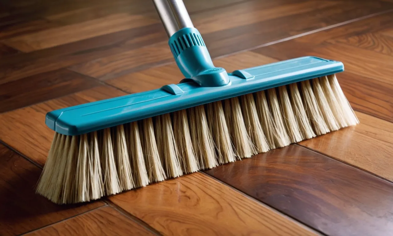 A close-up shot of a sleek, modern broom gliding effortlessly over a pristine hardwood floor, capturing every strand of pet hair with its soft bristles.
