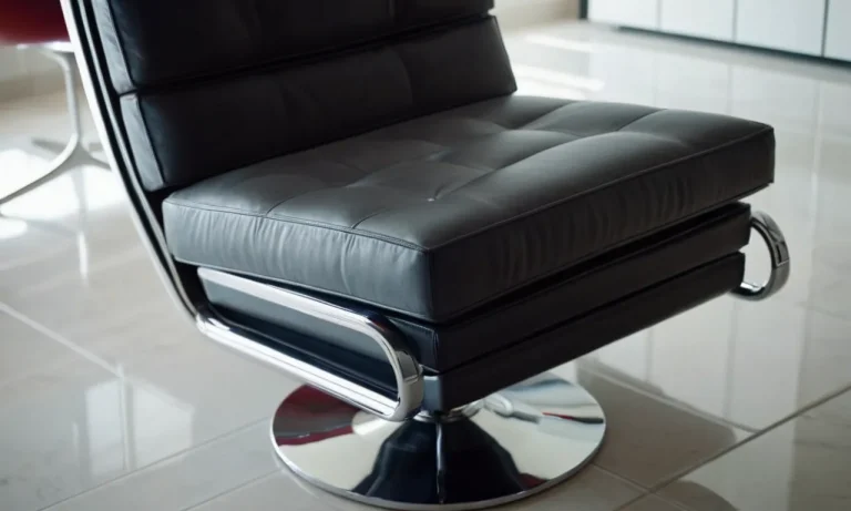 A close-up shot of a sleek, modern chair gliding effortlessly on a pristine tile floor, showcasing the seamless and smooth movement provided by the best chair glides.