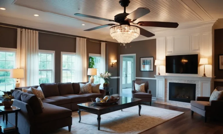 A wide-angle shot capturing a spacious living room with a grand chandelier-style ceiling fan as its focal point, exuding elegance and functionality for large room cooling needs.