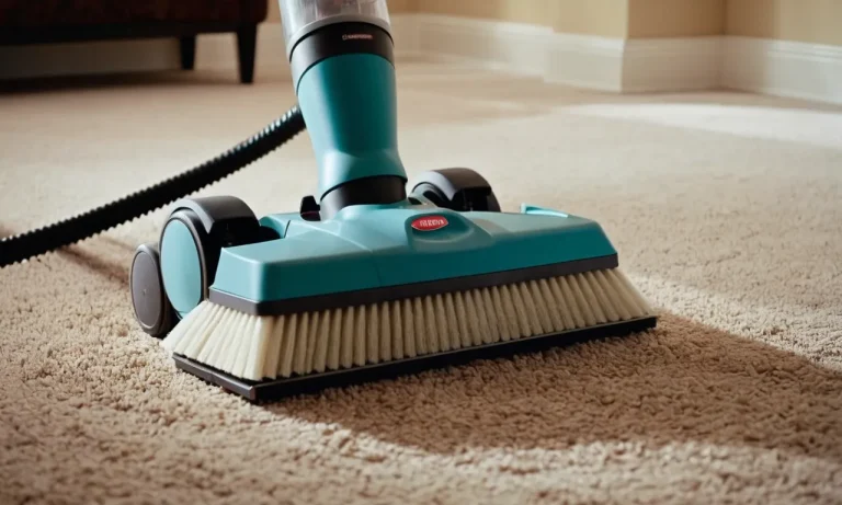 A close-up shot capturing the powerful bristles of a carpet and upholstery cleaner machine as it effortlessly removes dirt and stains, leaving behind a revitalized and fresh-looking surface.