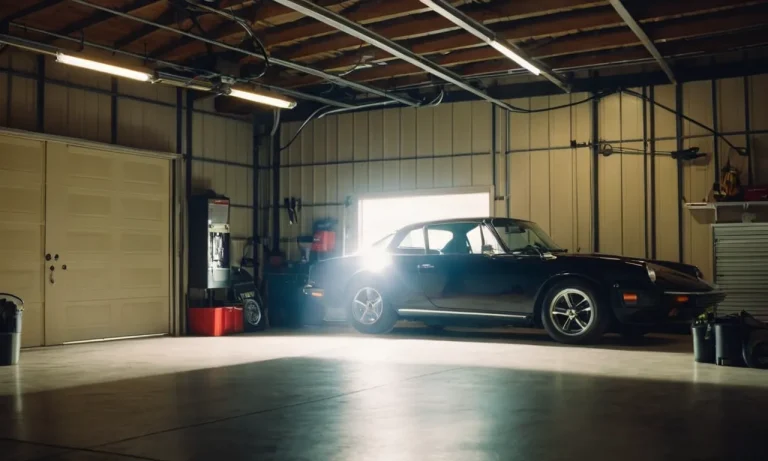 A close-up shot of a well-lit garage with a sleek, energy-efficient LED light bulb hanging from the ceiling, illuminating the space and enhancing visibility for the garage door opener.