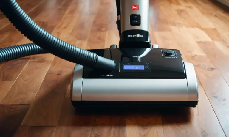 A close-up shot of a sleek Miele vacuum gliding effortlessly over a pristine hardwood floor, capturing the essence of its superior cleaning capabilities and stylish design.