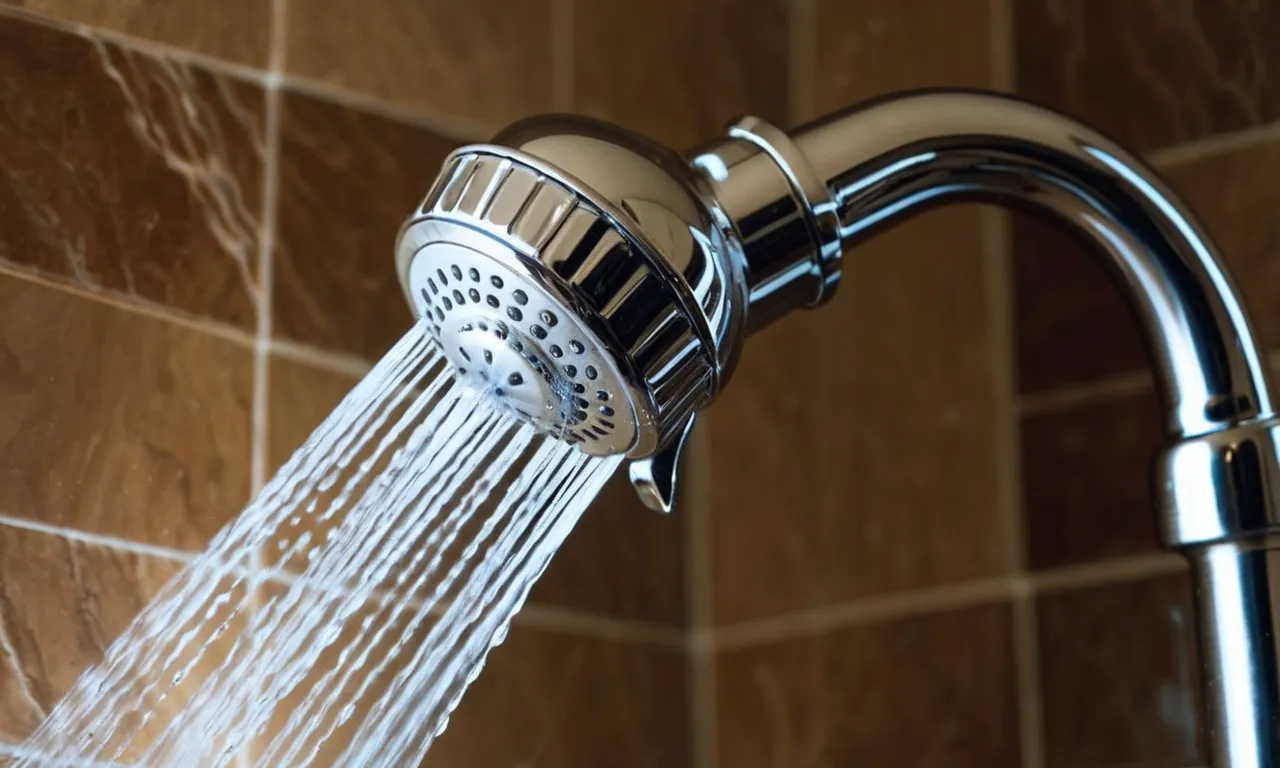 A close-up shot of a crystal-clear showerhead with water flowing through it, capturing the essence of a best shower filter for hair loss.