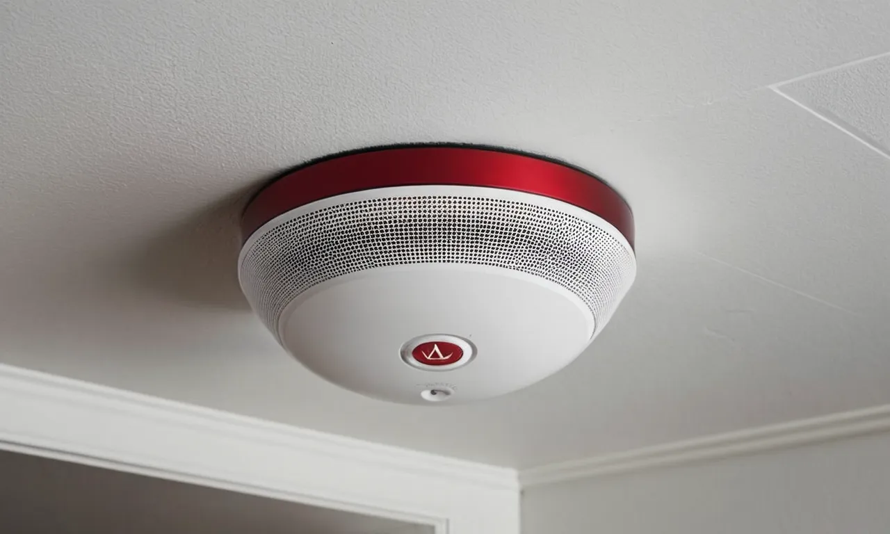 A close-up shot of a sleek and modern hardwired smoke and carbon monoxide detector mounted on a white wall, providing a sense of safety and security.