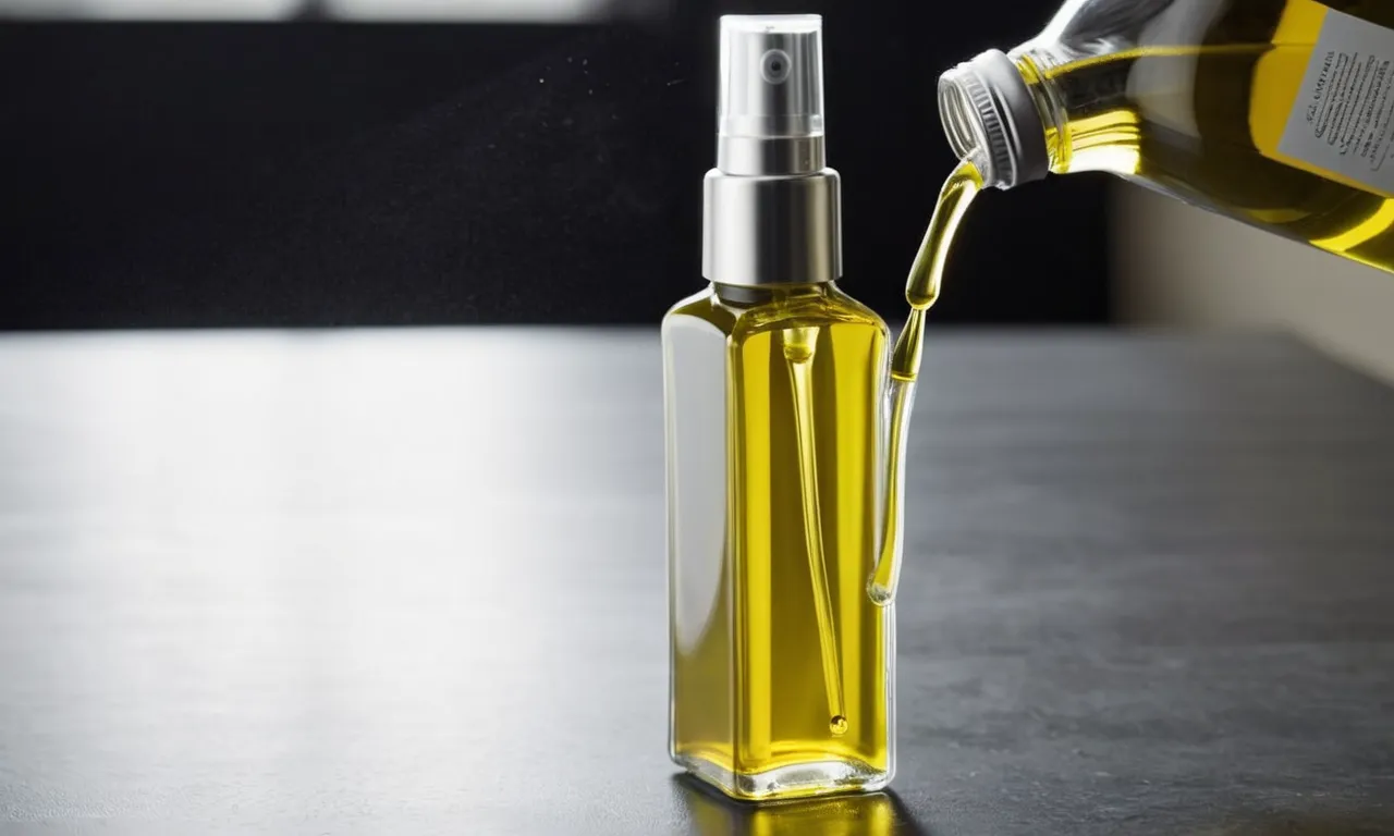 A close-up photo of a sleek, transparent spray bottle filled with high-quality olive oil, showcasing its fine mist nozzle and ergonomic design.