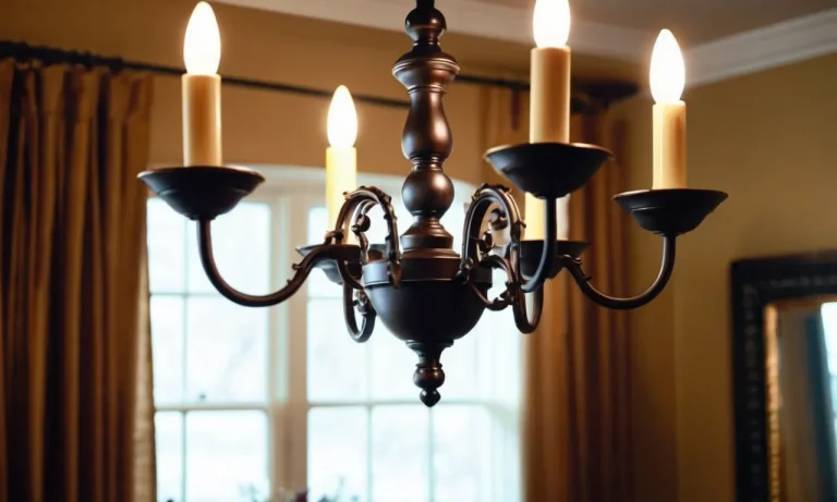 A close-up photo capturing the flawless finish of a vintage chandelier, transformed with the best oil rubbed bronze spray paint, showcasing its rich, deep brown color and elegant metallic sheen.