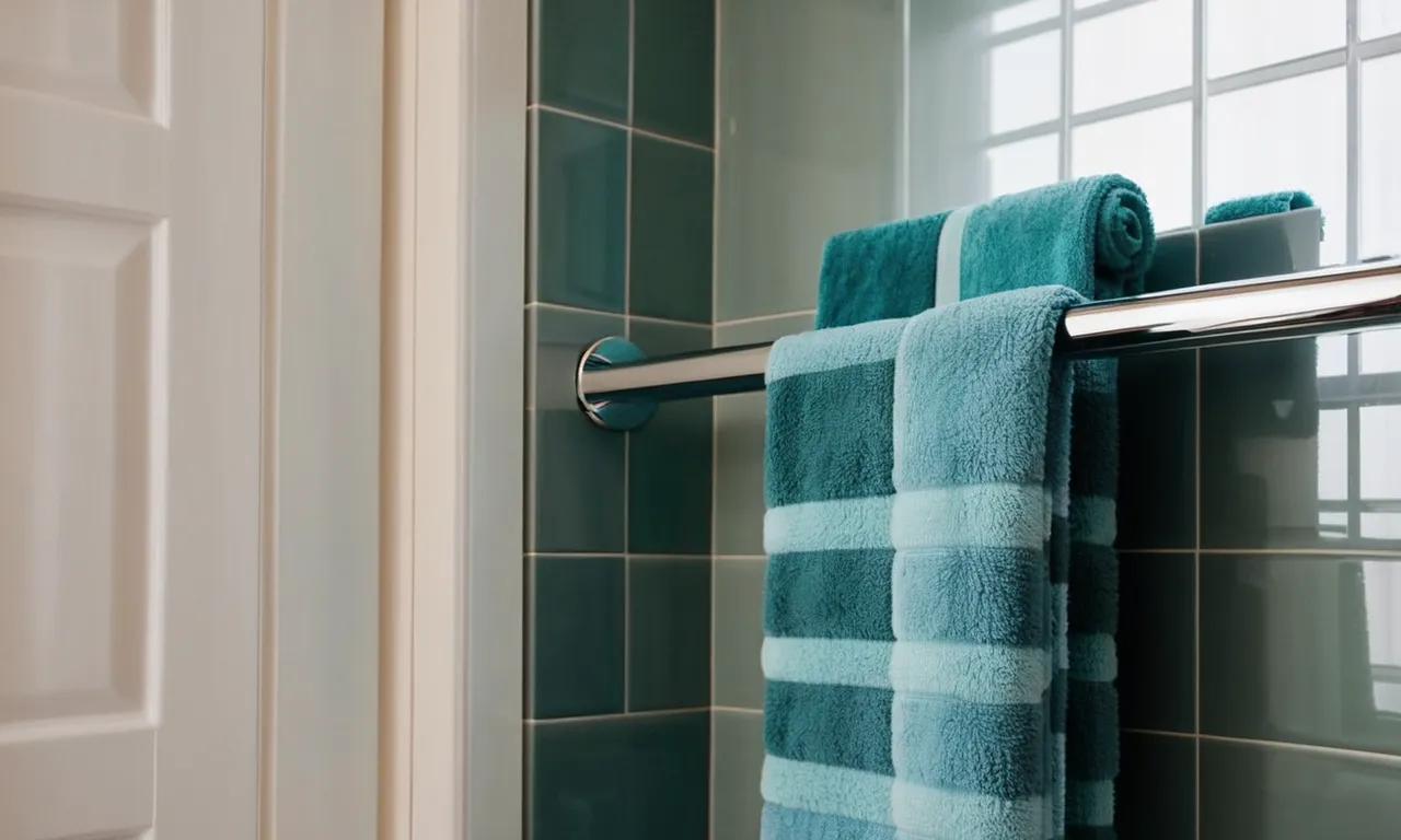 A close-up shot of a sleek, wall-mounted towel rack in a small bathroom, showcasing its compact design and efficient use of space.