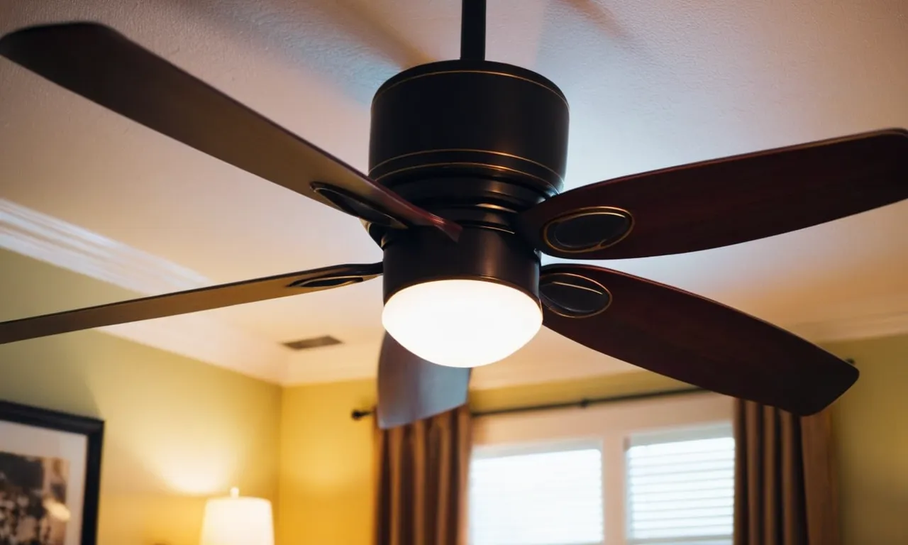 A close-up shot capturing the elegant silhouette of a sleek bedroom ceiling fan with integrated lights, bathing the room in a soft glow and providing a cool breeze on a summer night.